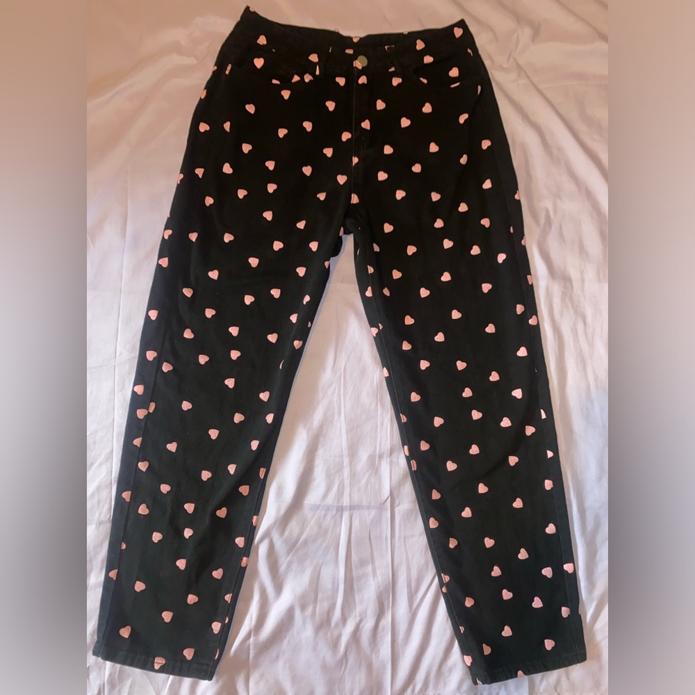 SHEIN black straight leg jeans with pink heart pattern